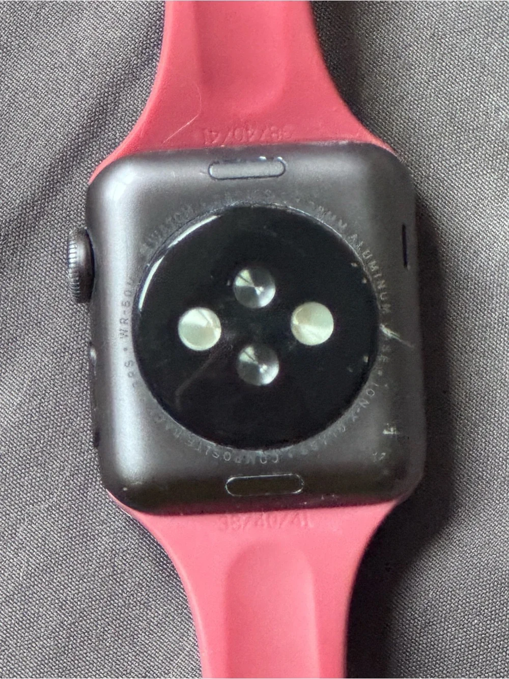 Apple Watch Series 3 with red silicone band